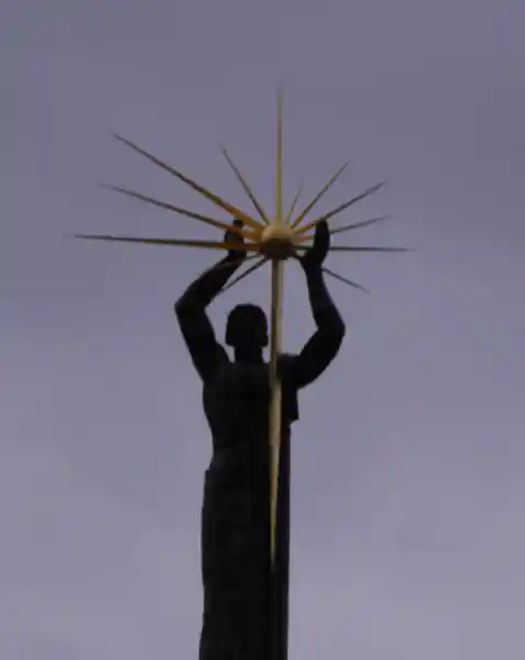 The bronze man and the sun monument, man and sun angle